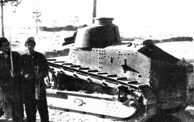 An FT-17. In Afghanistan. Beside an Afghan with an AK. These little tanks held together for quite a while.