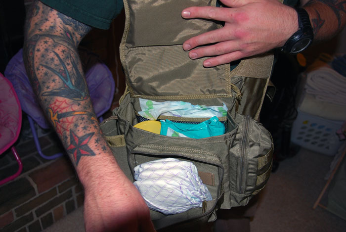 Inside the low profile kit, showing wipes, diapers etc.
