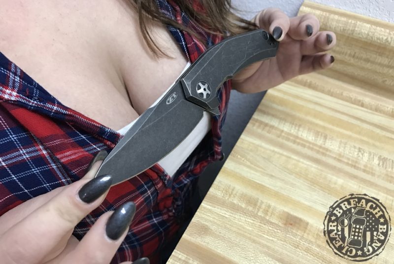 Woman holding the ZT0095BW Zero Tolerance Folding Knife