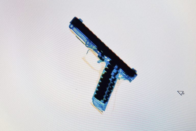 X-ray screening of a firearm