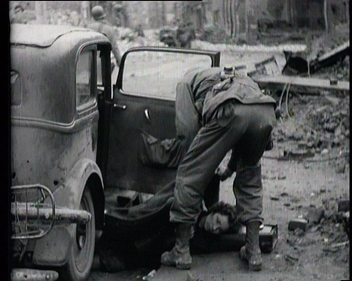 A civilian casualty of the 3rd Armored Divisions advance into Cologne. 