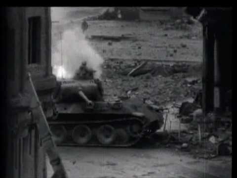 German Panther tank fighting an American T-26 Pershing near the cathedral during the Battle of Cologne. The 3rd Armored Division was supporting advancing Allied infantry. 