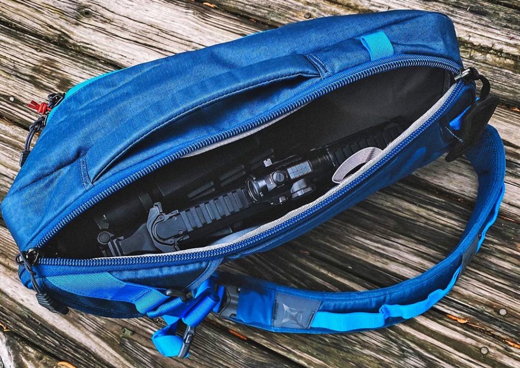 Vertx Commuter Sling concealed carry backpack in use