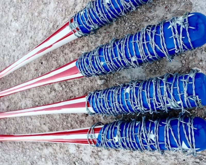 Primal Concepts tactical bat in red, white, and blue.