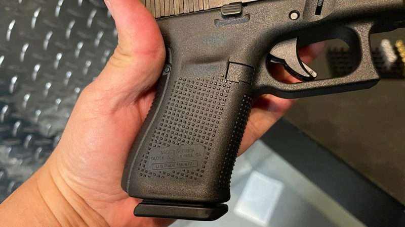 On the new Glock 19 Gen 5 the grip has the same pattern and texture as the Gen 4 but is missing the finger grooves. Photo credits Adam Campbell/Guns.com