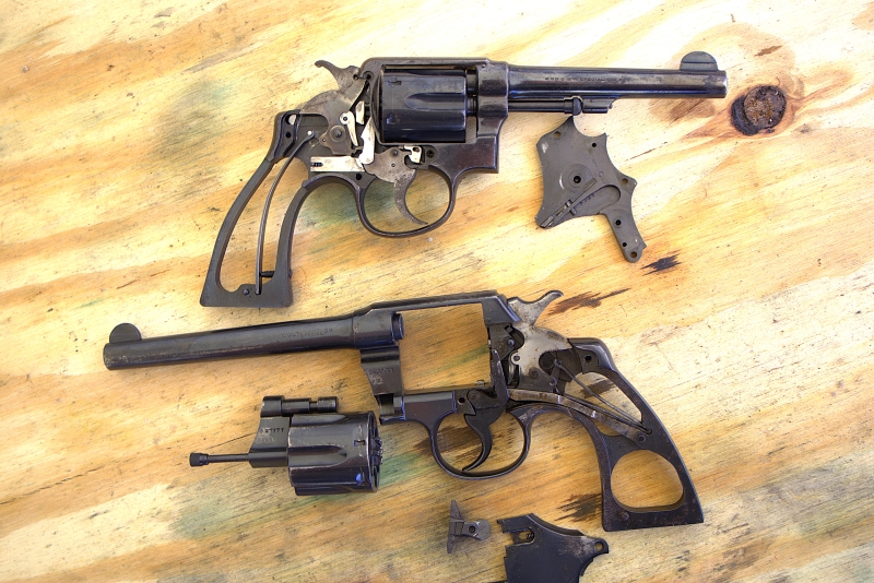 smith & wesson m&p and colt official police disassembled