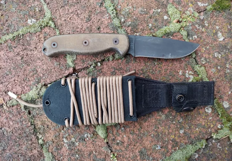 Ontario TAK knife, sheath wrapped in paracord.