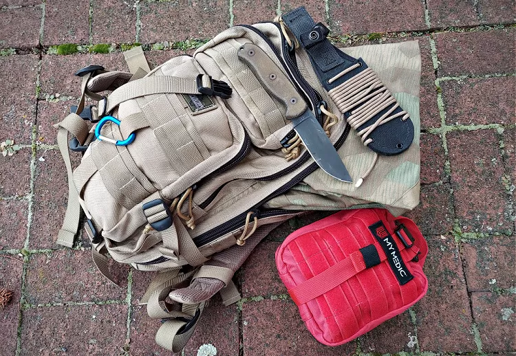 Survival bag, medical kit, knife