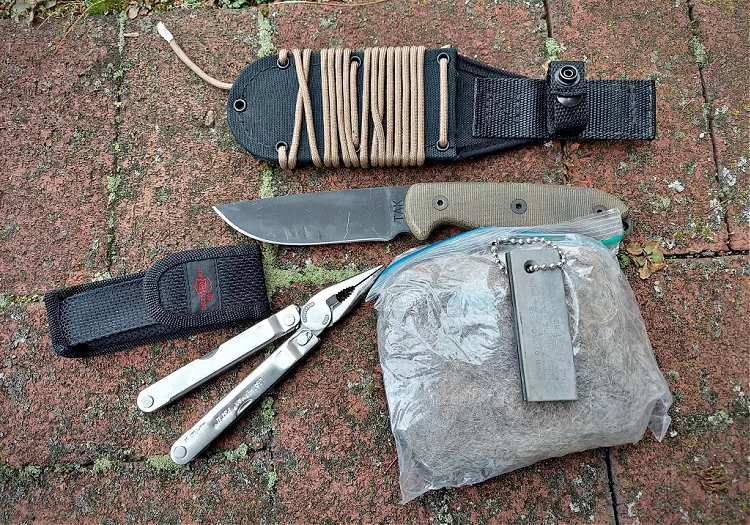 The TAK is a part of a fire starting kit, including a multi tool dryer lint, and ferocium rod.