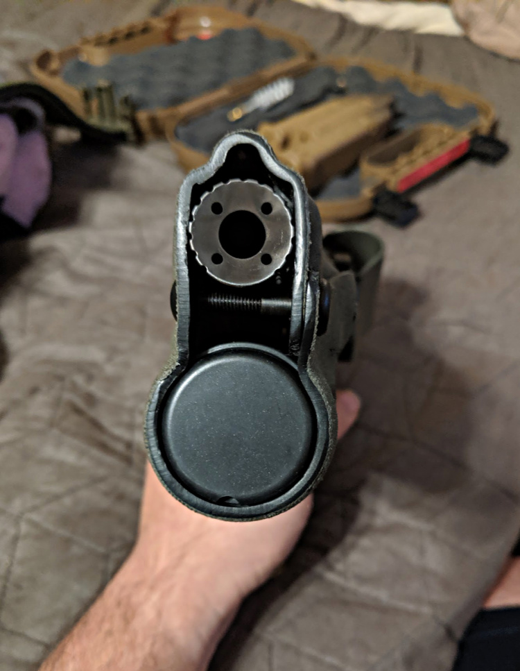 End-view of the BattleComp attached to the Glock G19X, holstered.