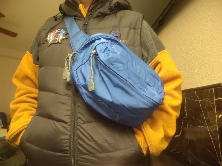 Author wearing the Vertx Long Walks Waist Pack