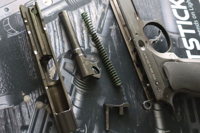 cz p01 pistol disassembled on a mat