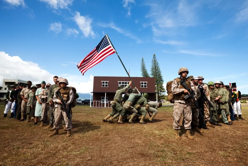 Marines at K Bay, Hawaii, showing all the uniforms and camouflage patterns worn by Marines since 1775.