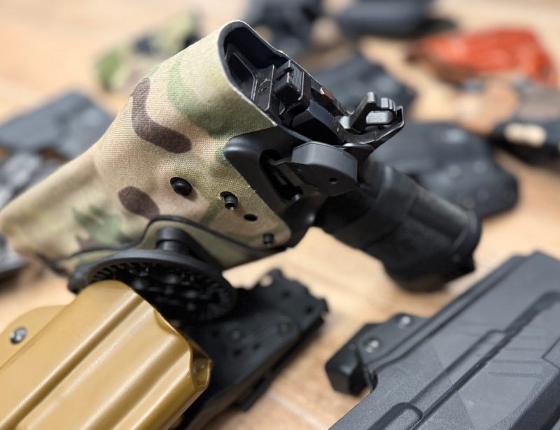 Safariland holster with OT Defense "nub" on retention release.