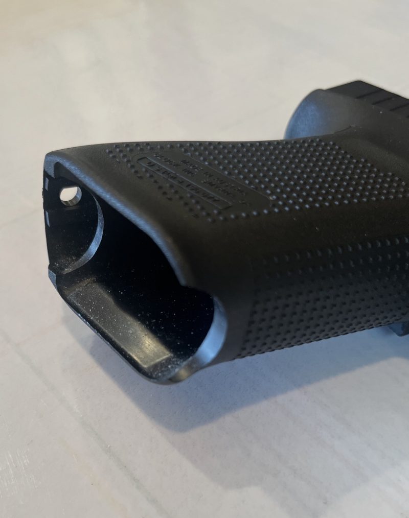 Early-generation Glock 19X frame detail showing factory magazine stripping grip cutout