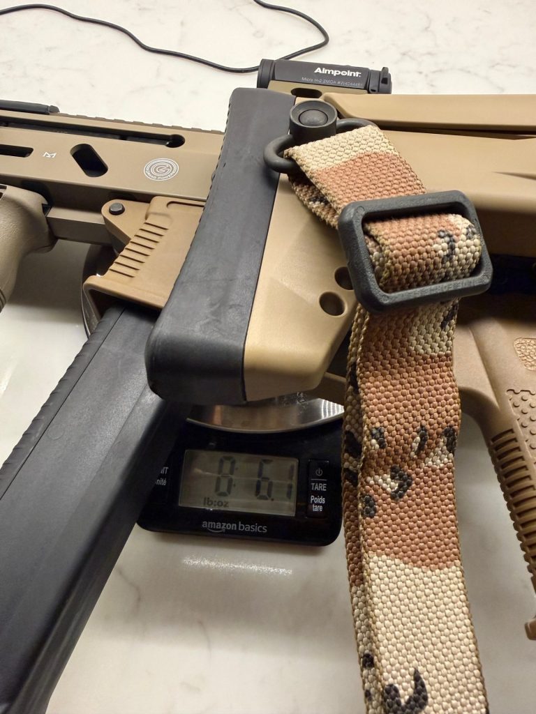 Stribog on my food scale, it weighs in at 8lbs 6 ounces with a loaded magazine.