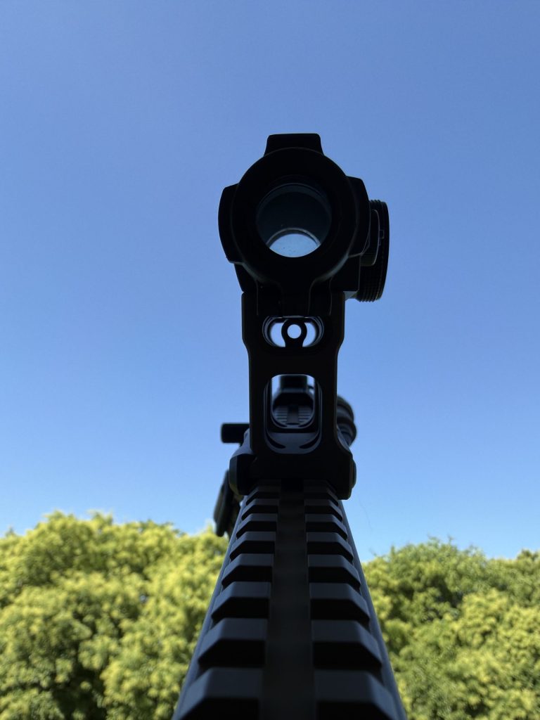 Looking through the Unity optic mount to see the backup iron sight.