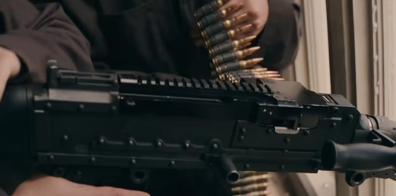 An islamist machine gunner sets up in a campus building in the Run Hide Fight movie.