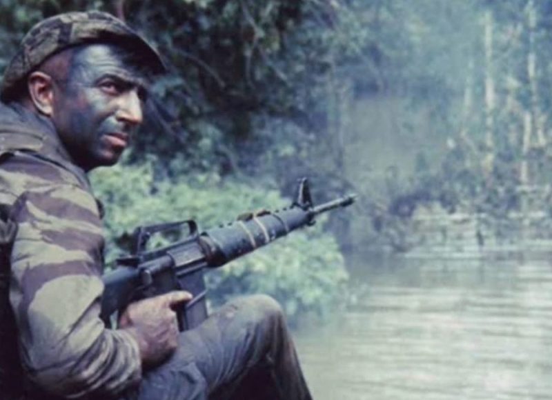 A RECONDO in tiger stripe cammies and early CAR15.